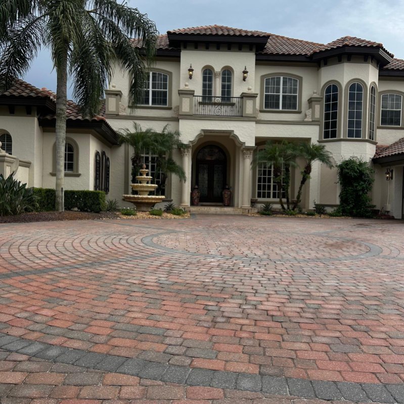 Clean paver driveway by Magic Outdoor Solutions FL